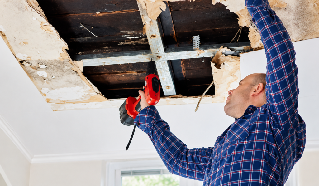 Housing Disrepair Liverpool damaged ceiling with exposed wooden joists