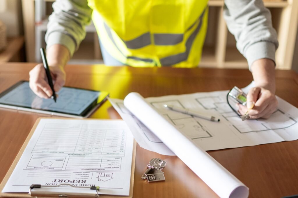 Chartered building surveyor conducting pre-acquisition due diligence survey for commercial property.