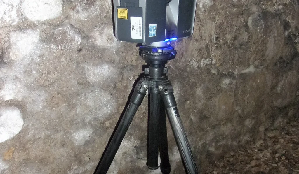 Measured building surveyor laser scanner capturing a building interior as a point cloud