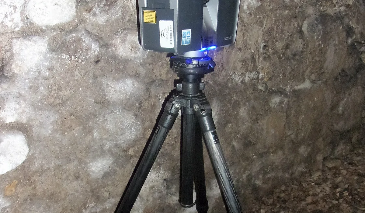 Measured building surveyor laser scanner capturing a building interior as a point cloud