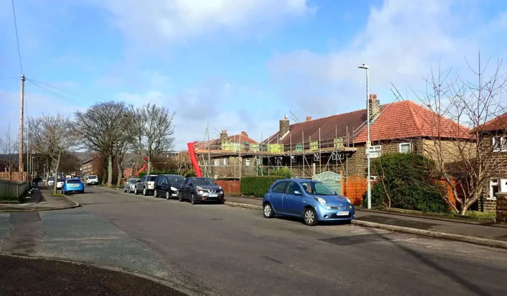 Planned preventative maintenance example, scaffolding up for roof repairs on a row of houses