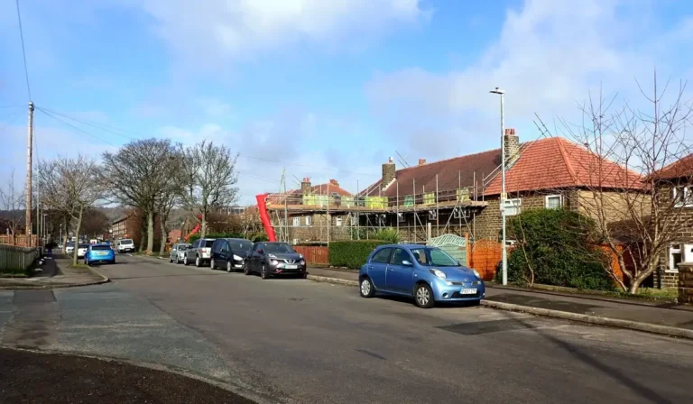 Planned preventative maintenance example, scaffolding up for roof repairs on a row of houses