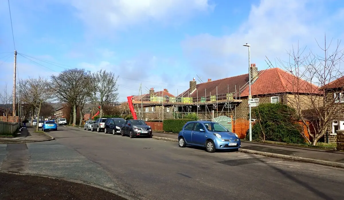 Planned preventative maintenance example, scaffolding up for roof repairs on a row of houses