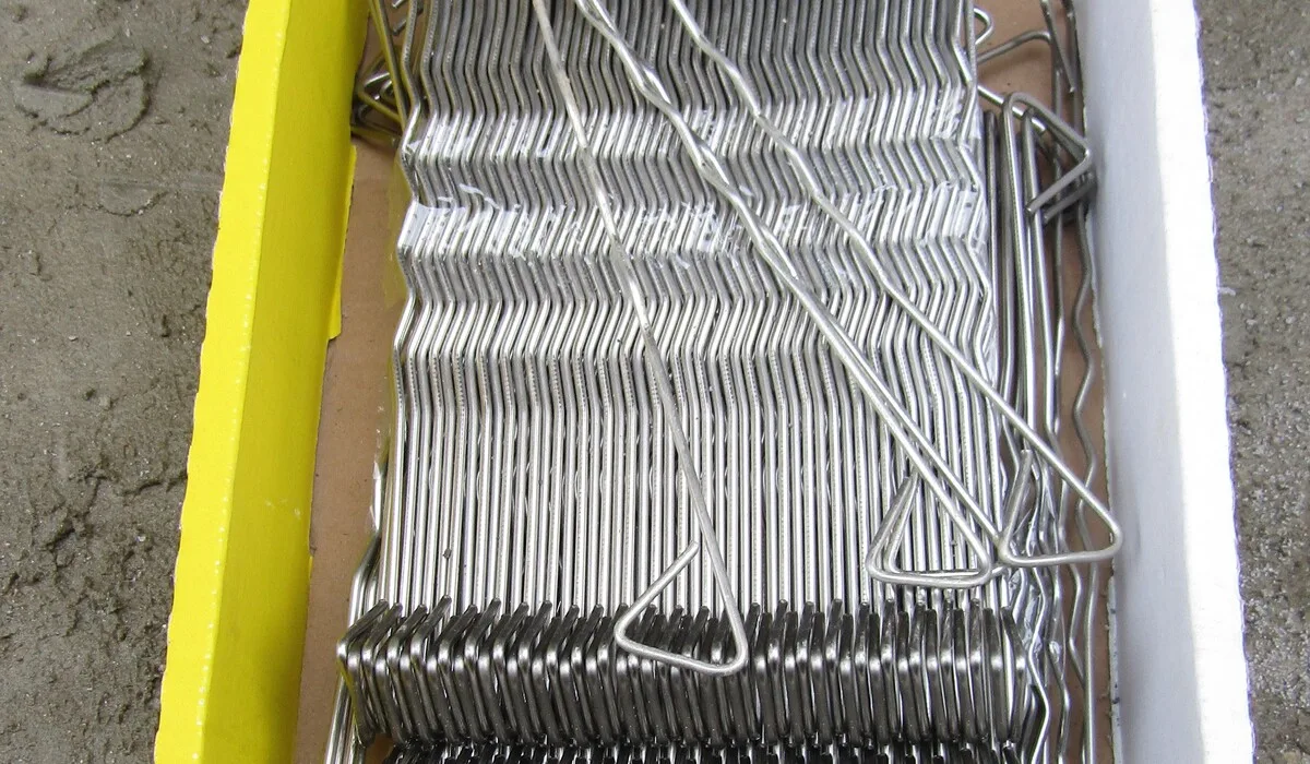 Wall tie failure repair, a box of stainless steel cavity wall ties ready to install